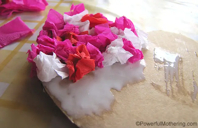 crunch up crepe paper and stick down