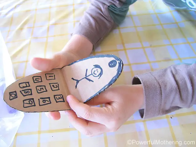 pretend play with cardboard phone