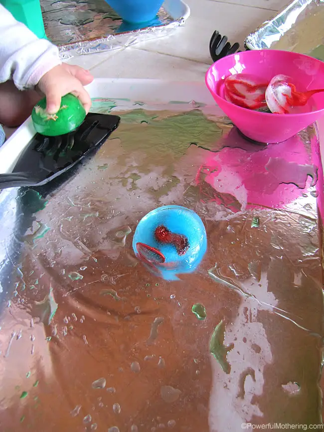 fine motor activities with ice play at PowerfulMothering.com