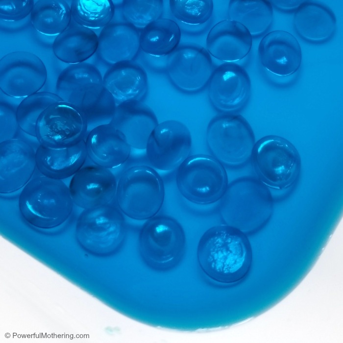 blue water for water sensory bin