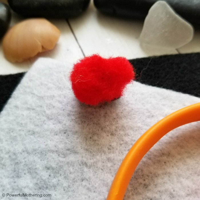 Materials for a pompom hermit crab craft