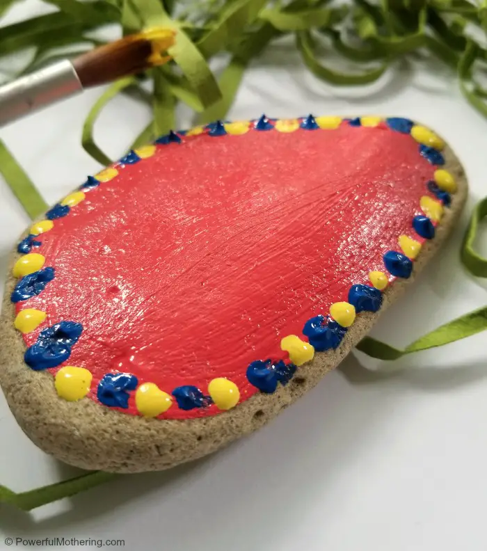 Decorating A Rock For A Father's Day Preschool Craft