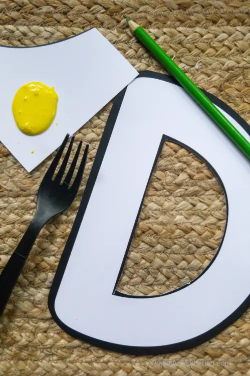 This D is for dandelion craft for kids is such a fun way to explore the letter D! This is an easy alphabet themed craft for kids, and one that you can make in under 30 minutes. Print out the template provided for you, then give this fun D themed craft a try!